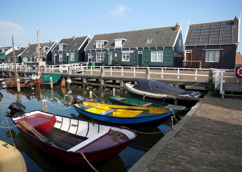 15989637 small boats docked in dutch fishing town of marken